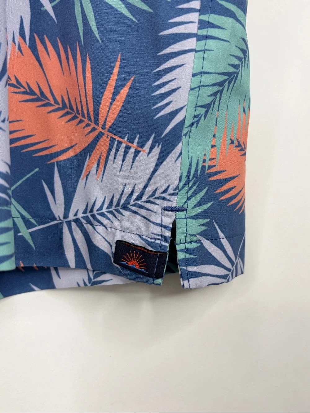 Faherty Navy Swim Shorts with Coral & Mint Leaf Print